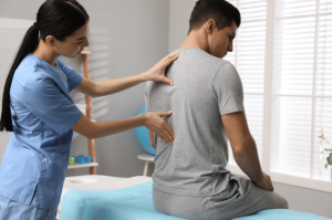 A therapist doing spine rehabilitation